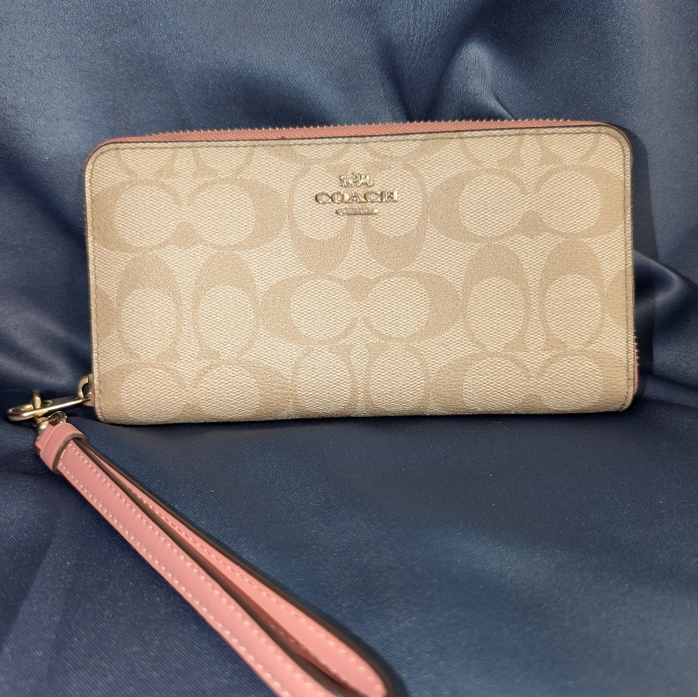 Coach Light Brown Tan Wristlet With Pink Trim and Gold Logo Mint Condition